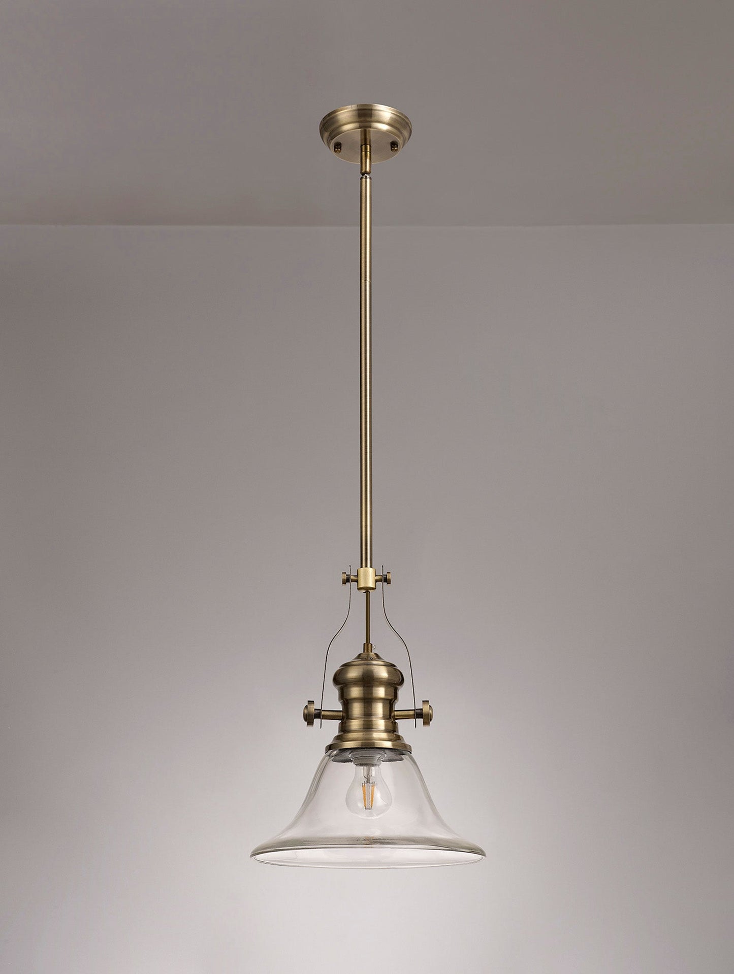 Stanley 1 Light Pendant E27 With 30cm Smooth Bell Glass Shade, Antique Brass and Clear
