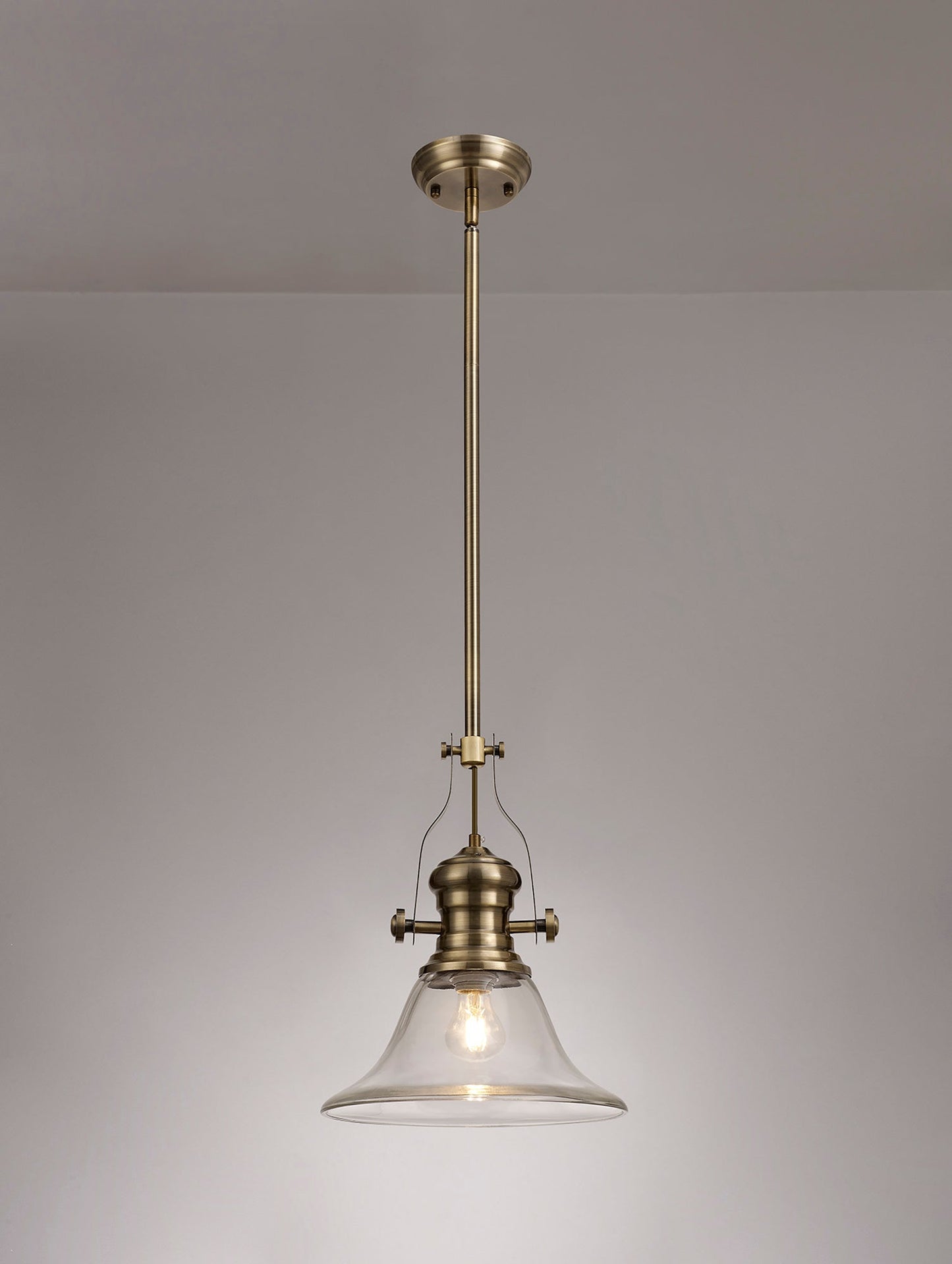 Stanley 1 Light Pendant E27 With 30cm Smooth Bell Glass Shade, Antique Brass and Clear